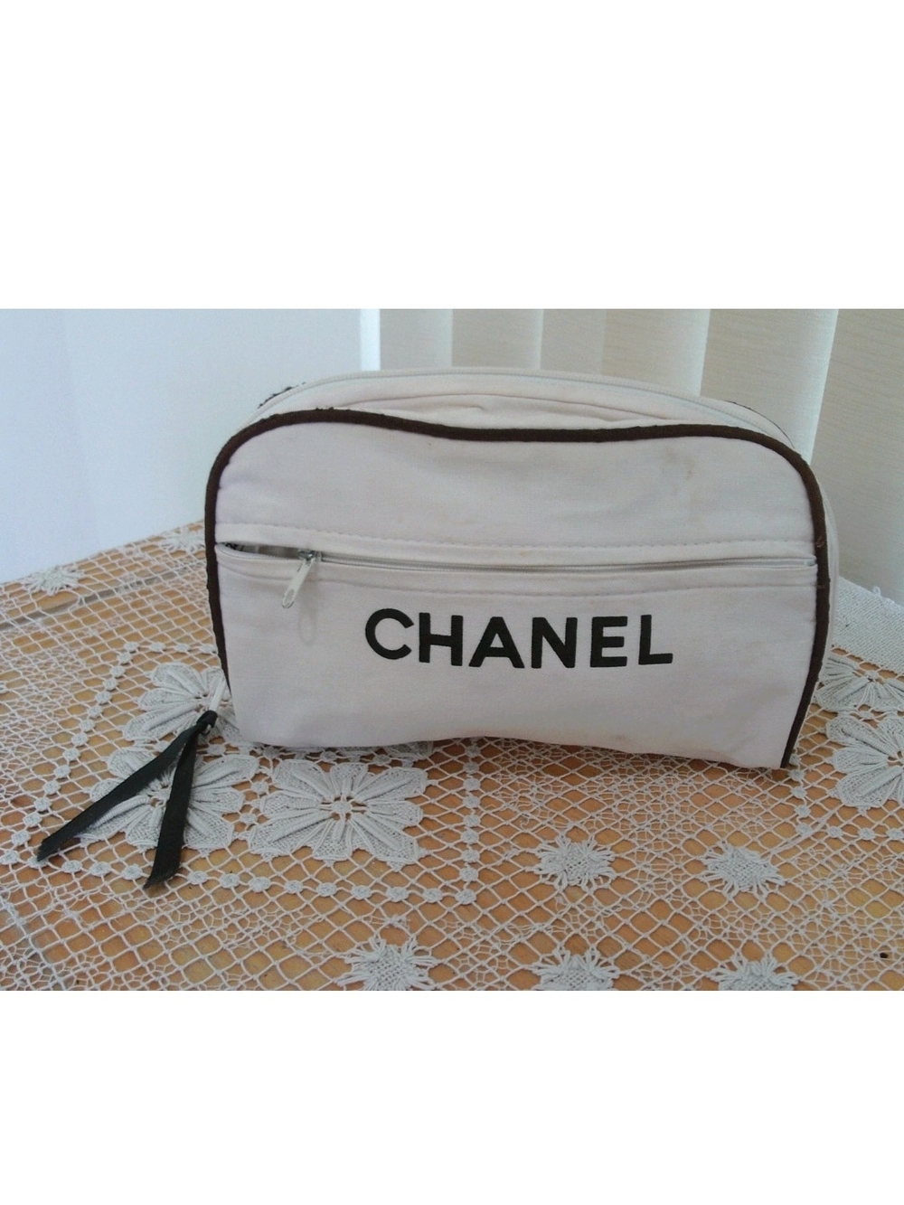 CHANEL Cream Cosmetic Pouch with Black Trim